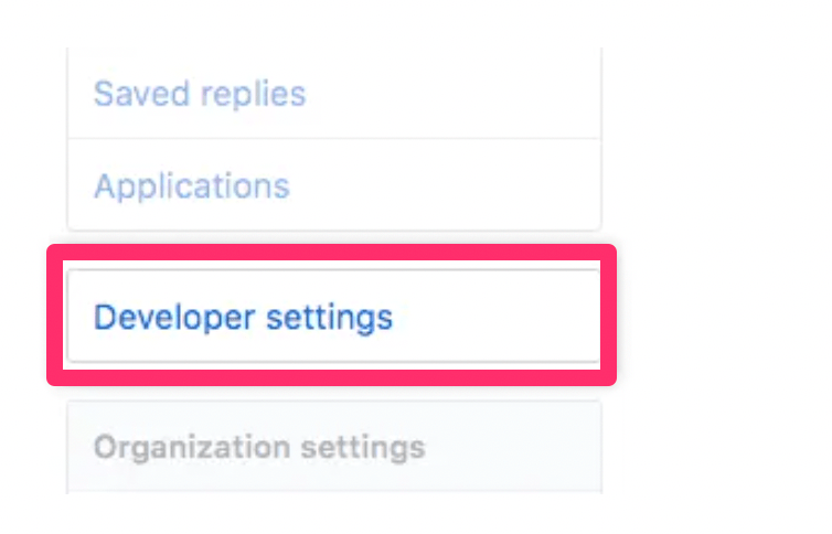 GitHub dropdown menu with red square around Developer settings button